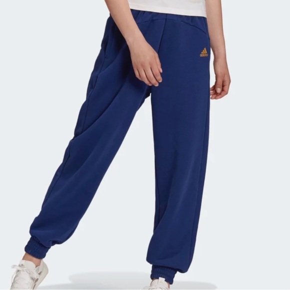 Adidas ESSENTIALS WARM GOLDEN LOGO PANTS size small - Picture 1 of 10